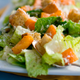 A Caesar salad with romaine lettuce.